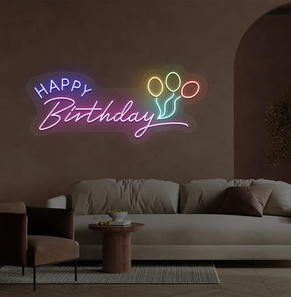 Stylish Happy Birthday LED neon sign glowing purple for celebration backdrop.