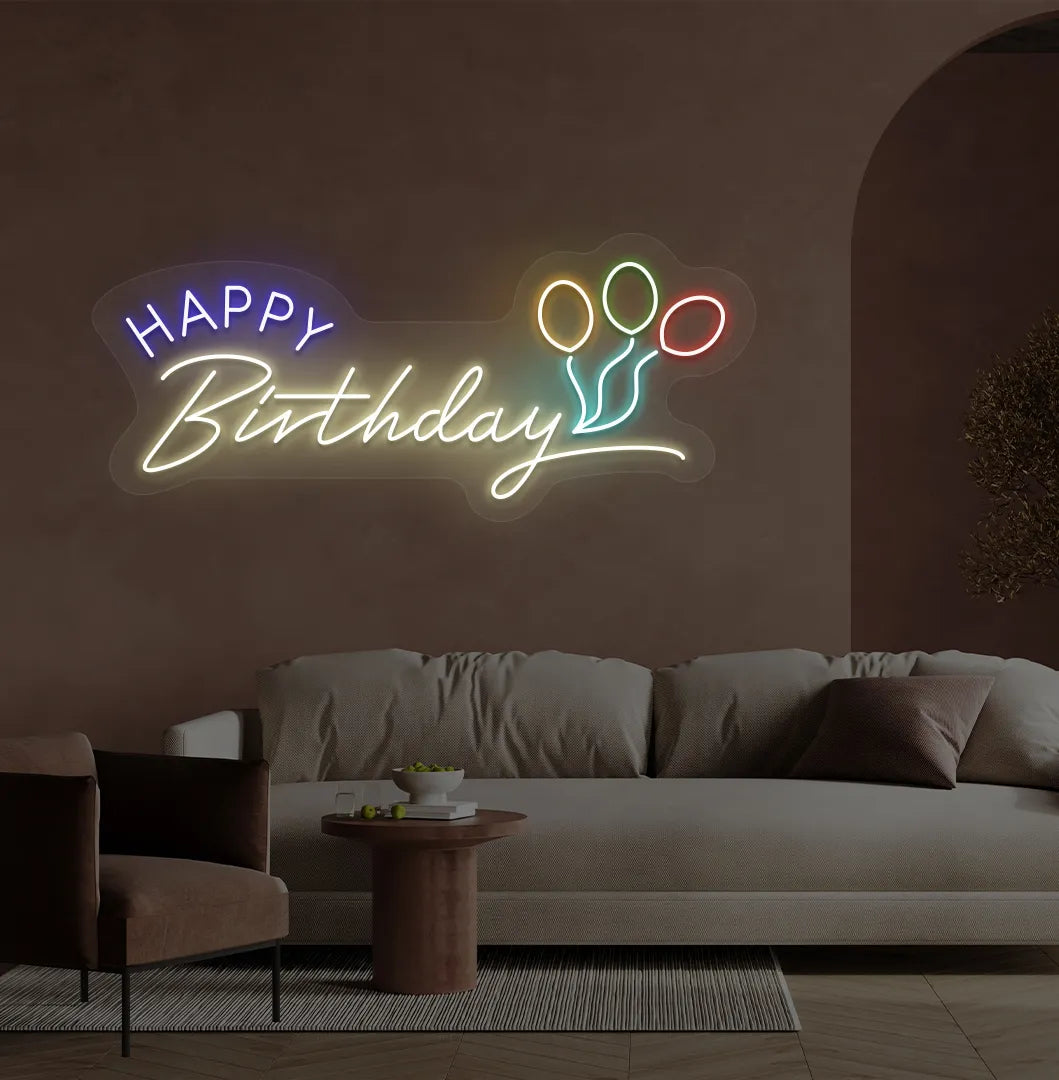 Stylish Happy Birthday LED neon sign glowing warm white for celebration backdrop.