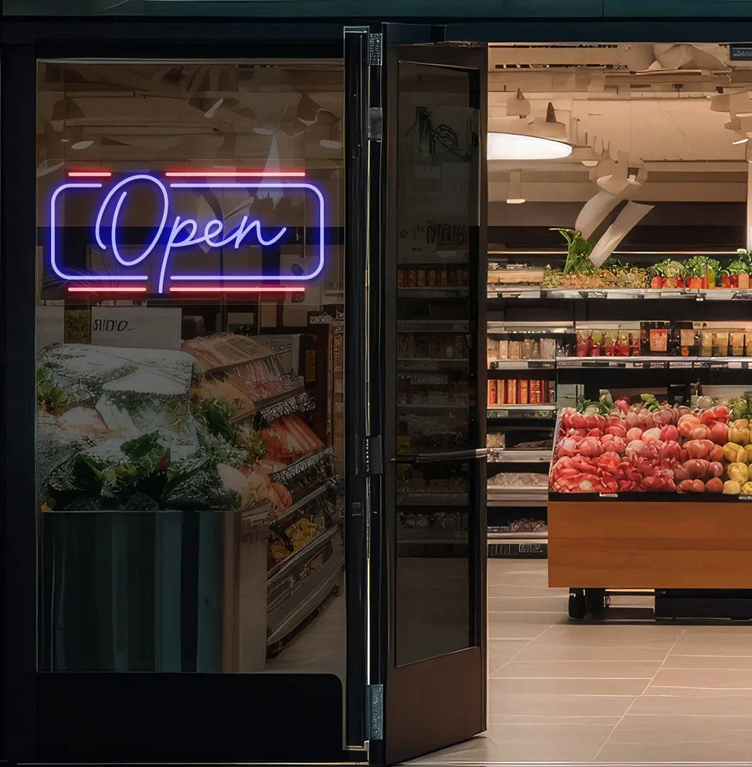 Image of an open LED neon sign glowing on a supermarket glass door in blue color.