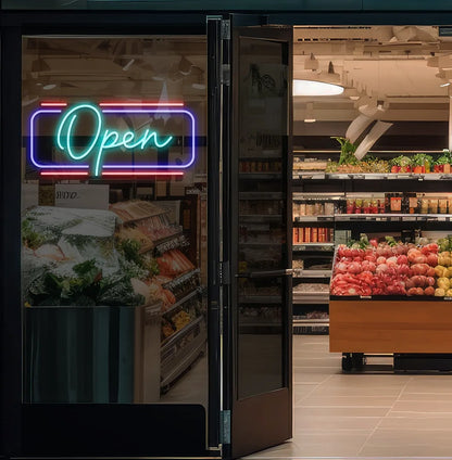 Image of an open LED neon sign glowing on a supermarket glass door in ice blue color.