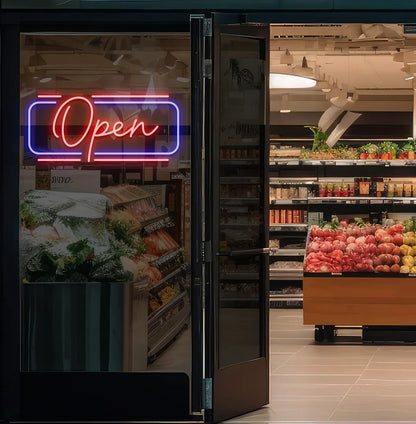 Image of an open LED neon sign glowing on a supermarket glass door in red color.