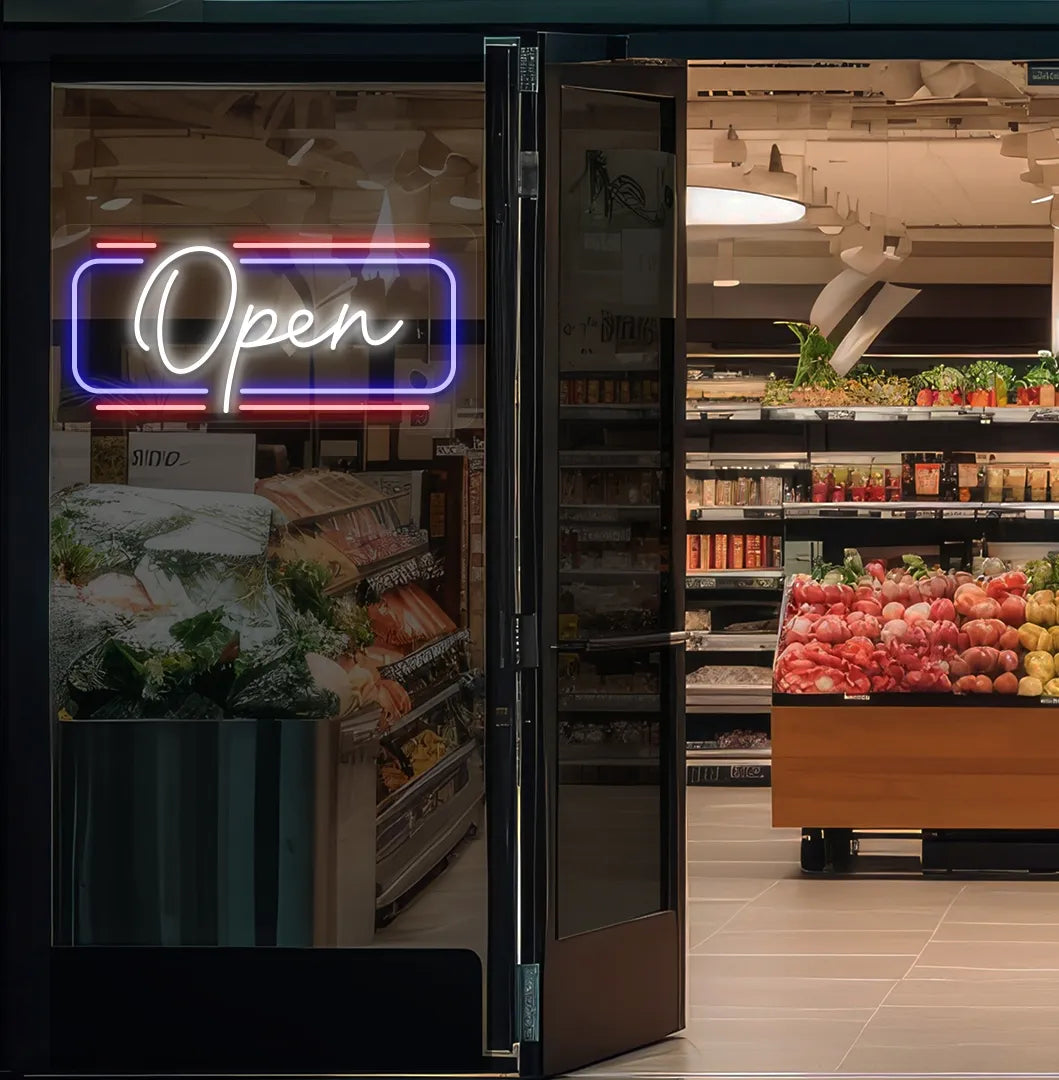 Image of an open LED neon sign glowing on a supermarket glass door in white color.
