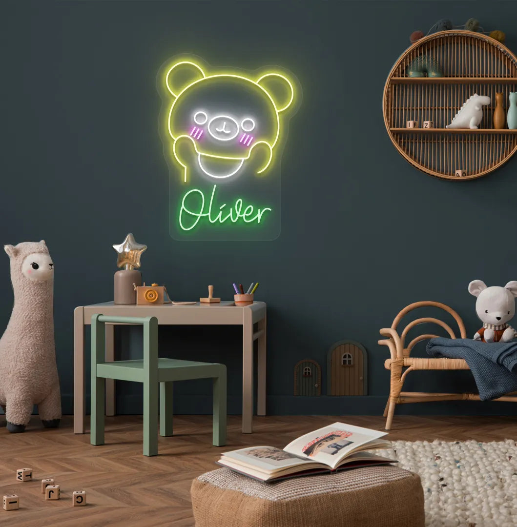 Teddy Bear Nursery Name neon sign glowing green on decorative wall.