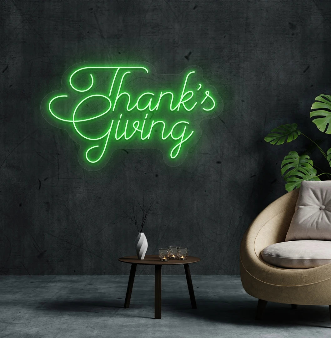 Festive thanksgiving neon sign in green mounted on living room wall.