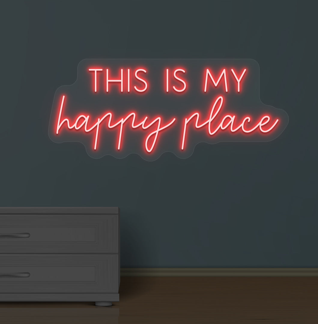 Image of a "this is my happy place" LED neon sign glowing on a wall in red color.
