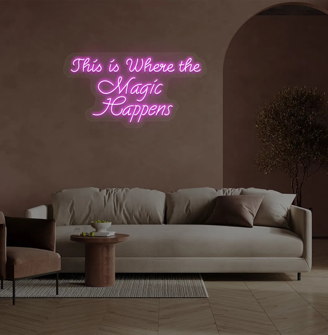 Image of a "This is where the magic happens" neon sign in pink color on salon wall decor.