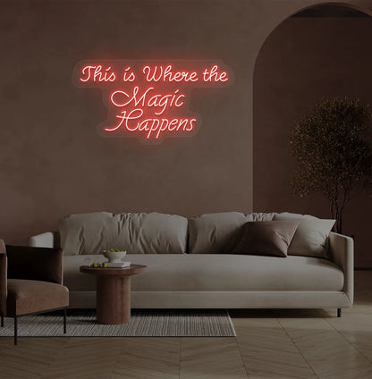 Image of a "This is where the magic happens" neon sign in red color on salon wall decor.