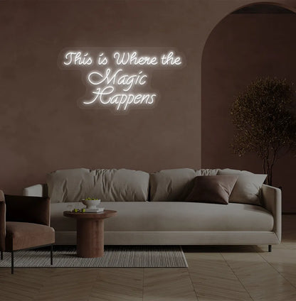 Image of a "This is where the magic happens" neon sign in white color on salon wall decor.