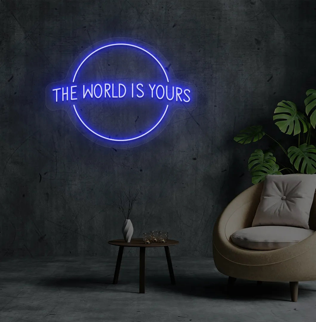 This World Is Yours neon sign mounted on aesthetic room wall in blue color.
