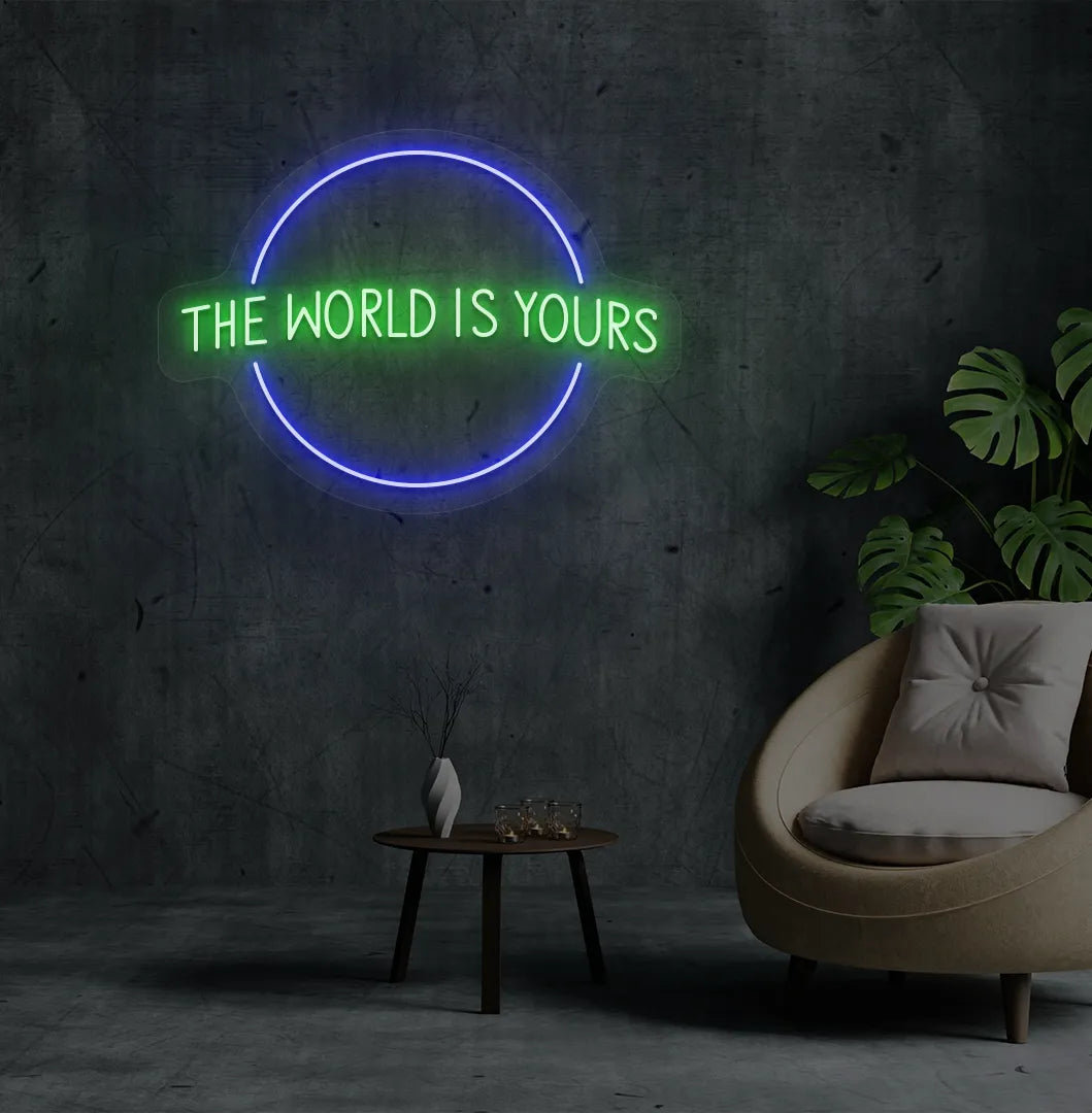 Image of a stylish This World Is Yours neon sign mounted on aesthetic room wall in green color.