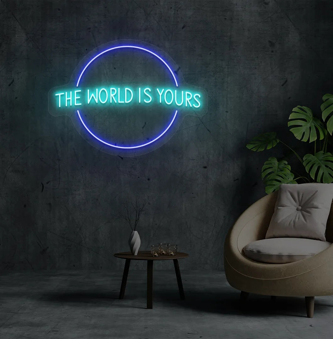 This World Is Yours neon sign mounted on aesthetic room wall in ice blue color.