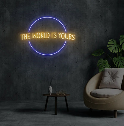 Image of a stylish This World Is Yours neon sign mounted on aesthetic room wall in orange color.