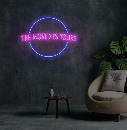 This World Is Yours neon sign mounted on aesthetic room wall in pink color.