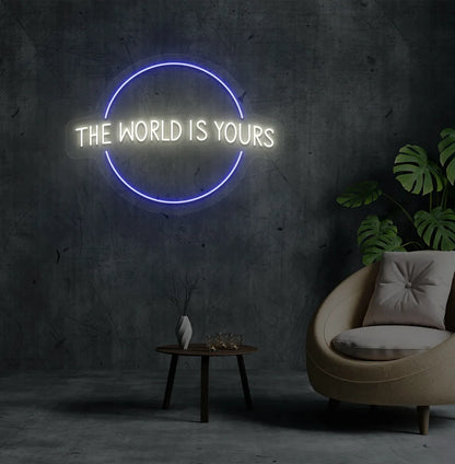 Image of a stylish This World Is Yours neon sign mounted on aesthetic room wall in warm white color.