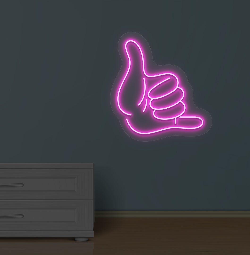 Image of a thumbs-up LED neon sign glowing on a wall in pink color.