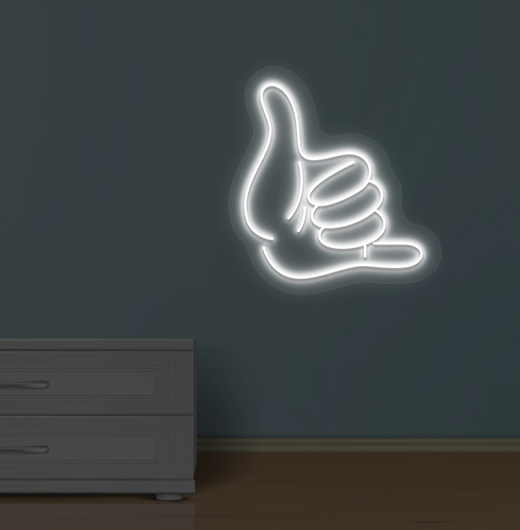 Image of a thumbs-up LED neon sign glowing on a wall in white color.
