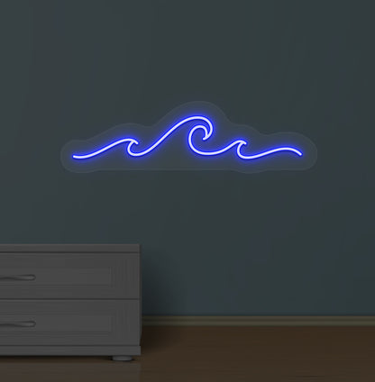 Image of an ocean-style wave neon sign glowing blue on a wall.
