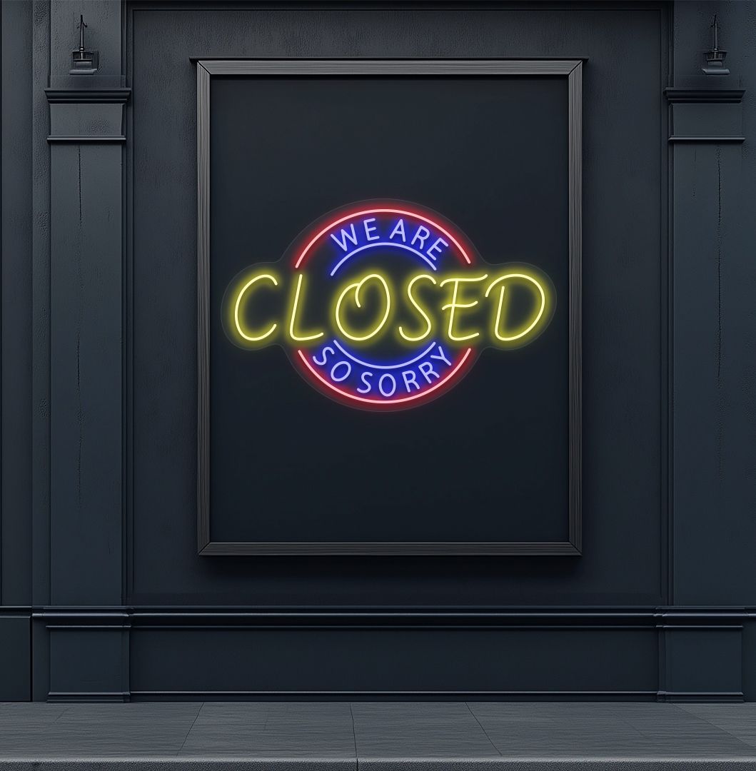 Stylish yellow LED we are closed so sorry neon sign mounted on wall. 