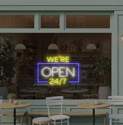 Stylish We Are Open 24/7 neon sign mounted on coffee shop glass door in white color.