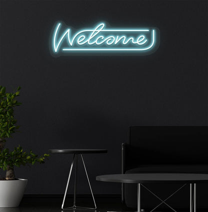 Image of a welcome neon sign mounted on aesthetic wall in ice blue color.