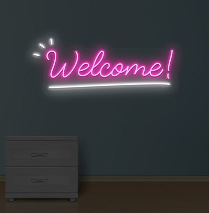 Image of a welcome neon sign LED glowing on wall in pink color.