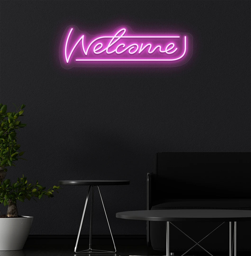 Image of a welcome neon sign mounted on aesthetic wall in pink color.