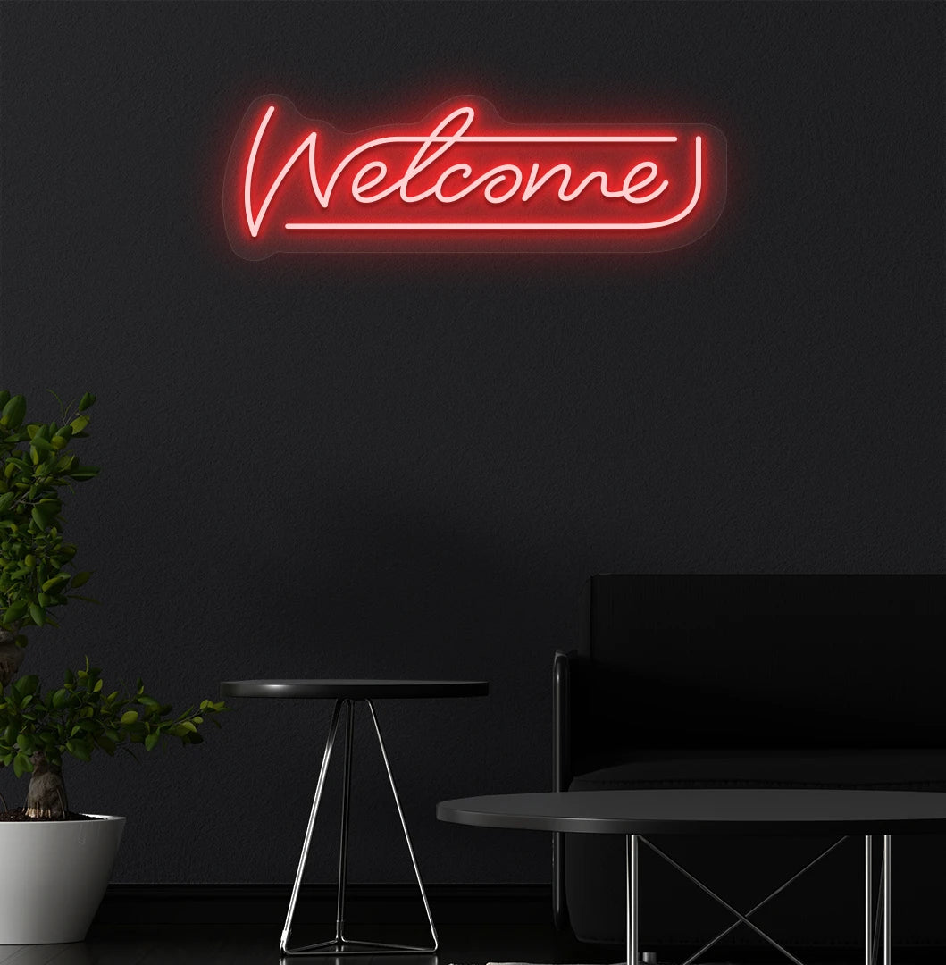Image of a welcome neon sign mounted on aesthetic wall in red color.