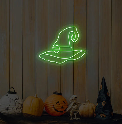 Green LED Witch Hat Neon Sign displayed on a Halloween themed background.