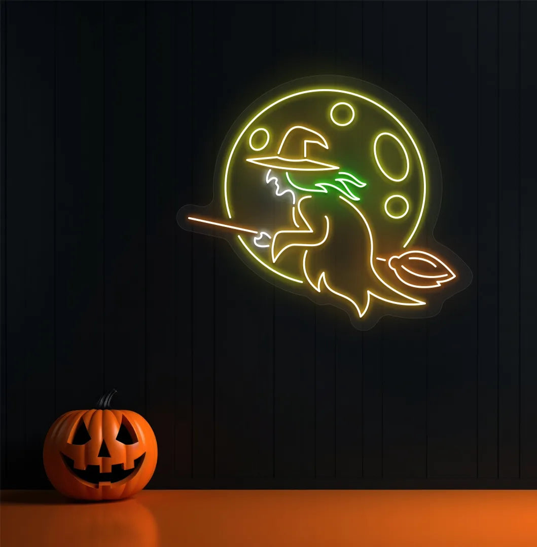Witch Neon Sign illuminated in orange on a spooky Halloween themed wall.