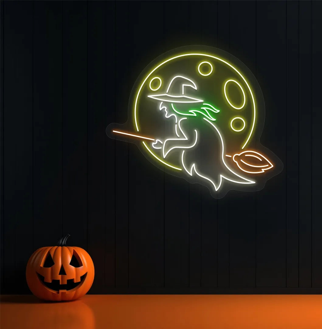 Witch Neon Sign illuminated in warm white on a spooky Halloween themed wall.
