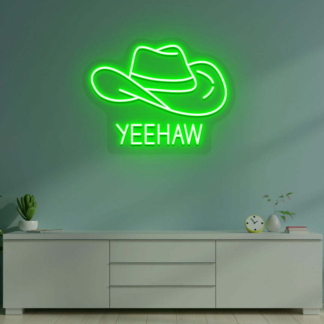 A western-style YEEHAW neon sign glowing green on the wall. Perfect for living rooms, western-themed interiors, parties, and home bars.