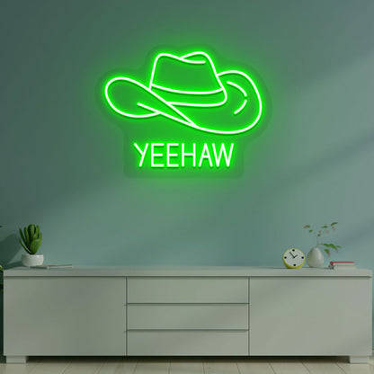 A western-style YEEHAW neon sign glowing green on the wall. Perfect for living rooms, western-themed interiors, parties, and home bars.