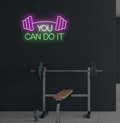 You can do it with dumbbell neon sign glowing green on aesthetic gym wall.
