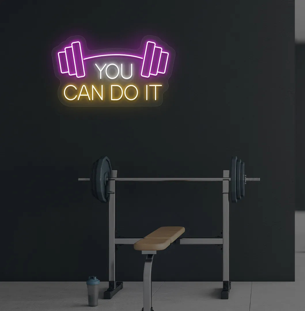 You can do it with dumbbell neon sign glowing orange on aesthetic gym wall.