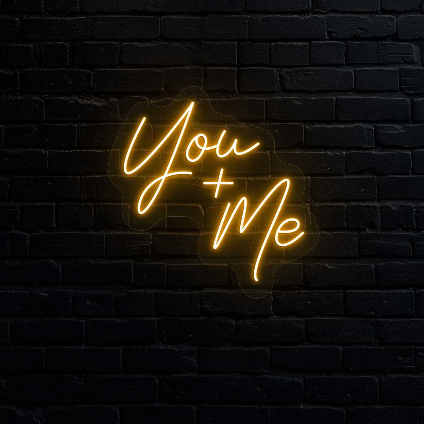 Aesthetic wall with "you plus me" neon sign glowing orange.
