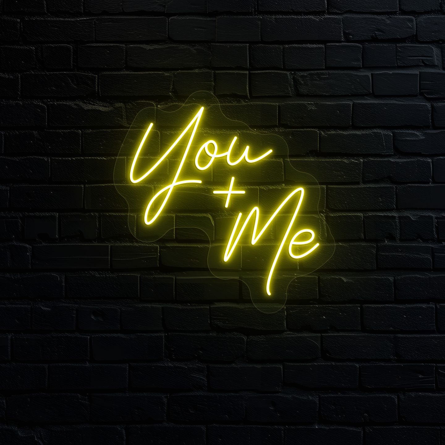 Aesthetic wall with "you plus me" neon sign glowing yellow.