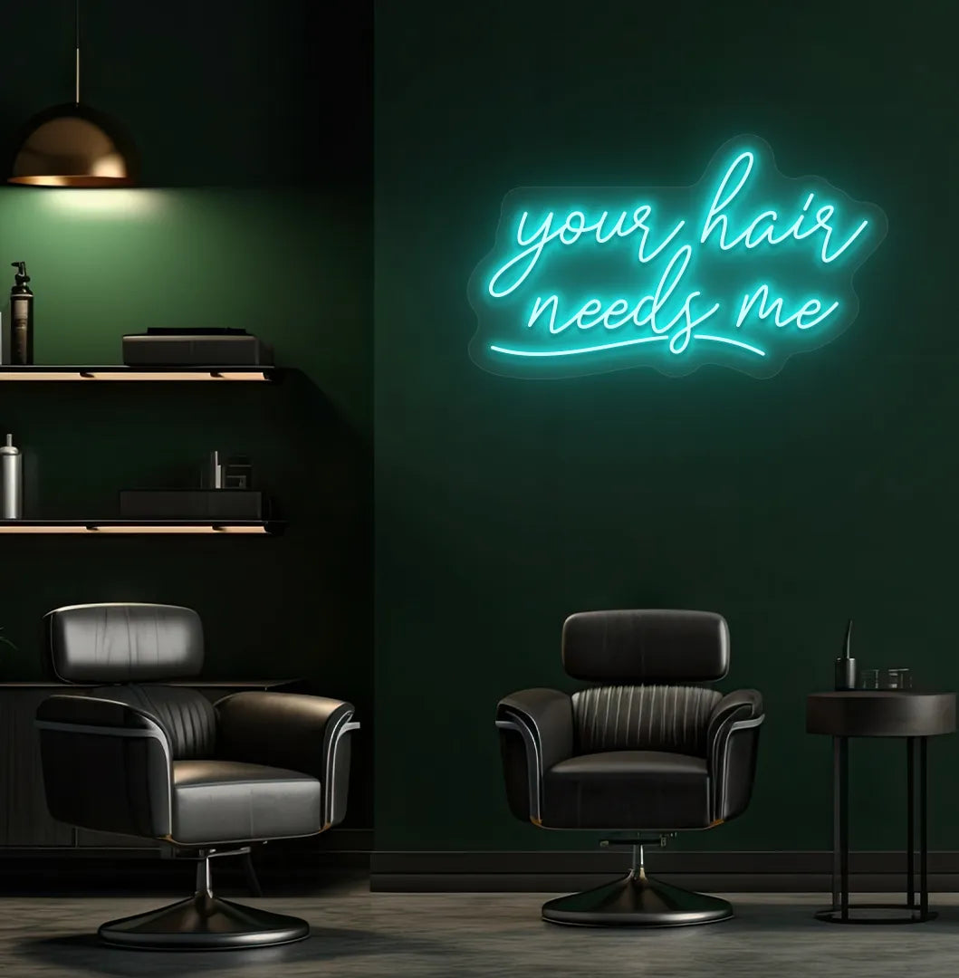 Beauty salon interior with Your Hair Needs Me neon sign glowing ice blue.