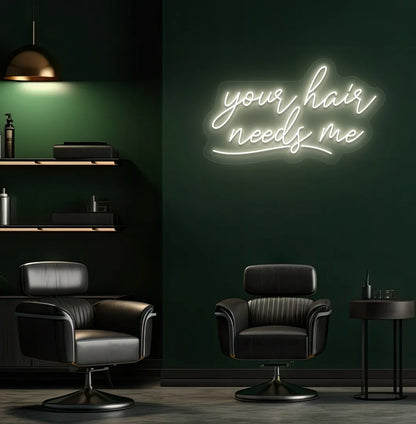 Image of a modern salon wall featuring Your Hair Needs Me neon sign in warm white color.